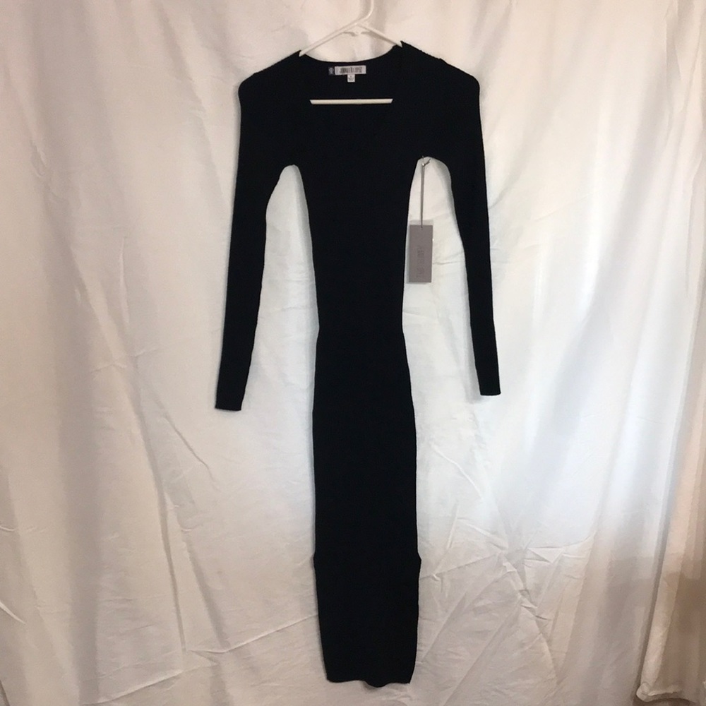 Jennifer Lopez black fitted stretch dress. Long sleeves. Side slits. NWT. Small.